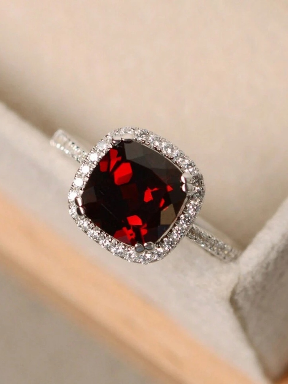 Garnet Halo Solitaire Ring in Deep Red